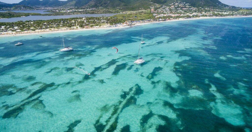 Motoryacht Loon luxury charter yacht in shallow waters of Saint Martin