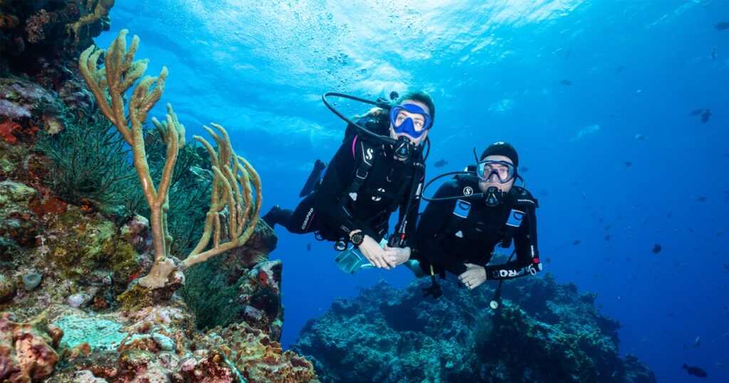 Charter yacht Loon guests diving at Little Exuma