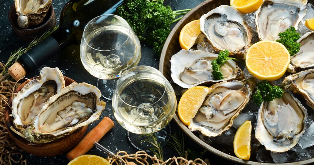 Wine and oysters served on Christmas day on board charter yacht Loon