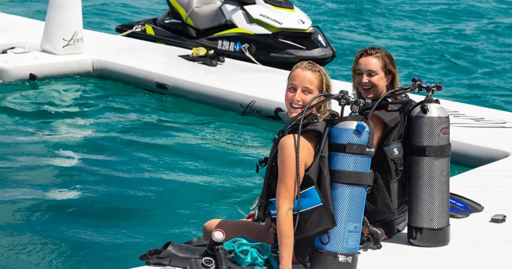 Charter guests in Scubapro diving gear on the FunAir Beach Club Sea Pool on Motor Yacht Loon in Norman Island