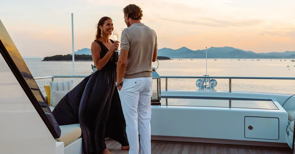Charter guests enjoying an evening drink on board MY Loon