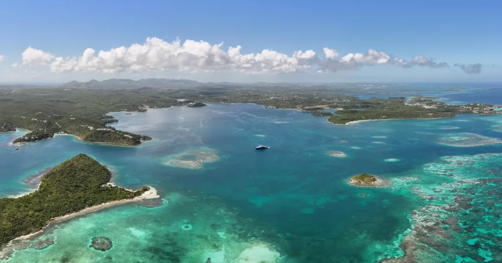 charter superyacht Loon anchored off the coast in Antigua during a luxury superyacht charter